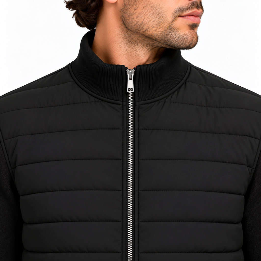 Black hybrid quilted jacket, close-up of quilting and knitted sleeve