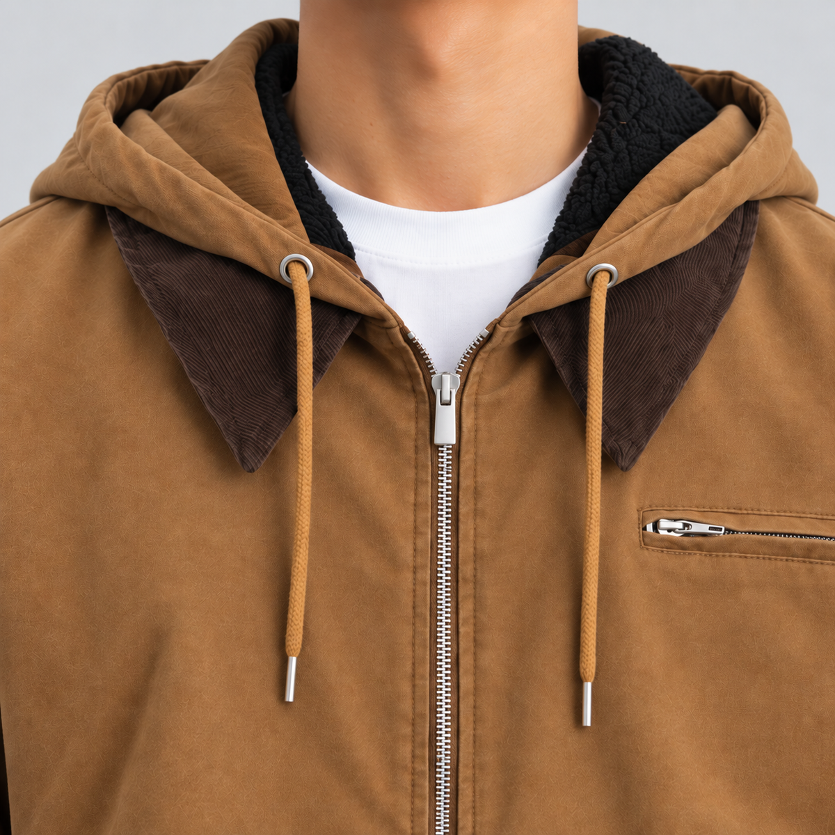 Close-up of the corduroy collar, sherpa-lined hood and zip chest pocket